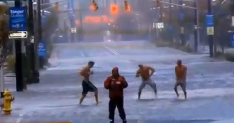 Men Dance Behind Reporter Covering Hurricane Sandy In Atlantic City 2012