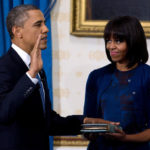 Photo of President Obama taking 2013 Oath of Office with Michelle
