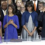 Photo of Sasha, Malia, Michelle, Barack Obama at inauguration parade