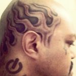 DJ Paul flame tattoo on his head