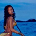 Rihanna in gold bikini on Copacabana Beach Brazil